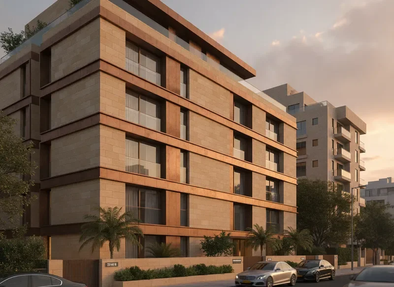חזית חיצונית של בניין מגורים יוקרתי מודרני בתל אביב בשעת שקיעה
